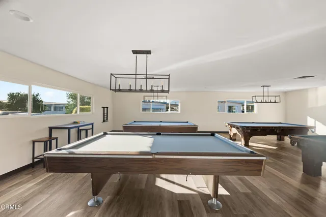 a living room with furniture and a table