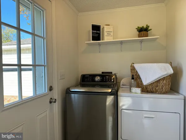 a kitchen with a stove and a microwave