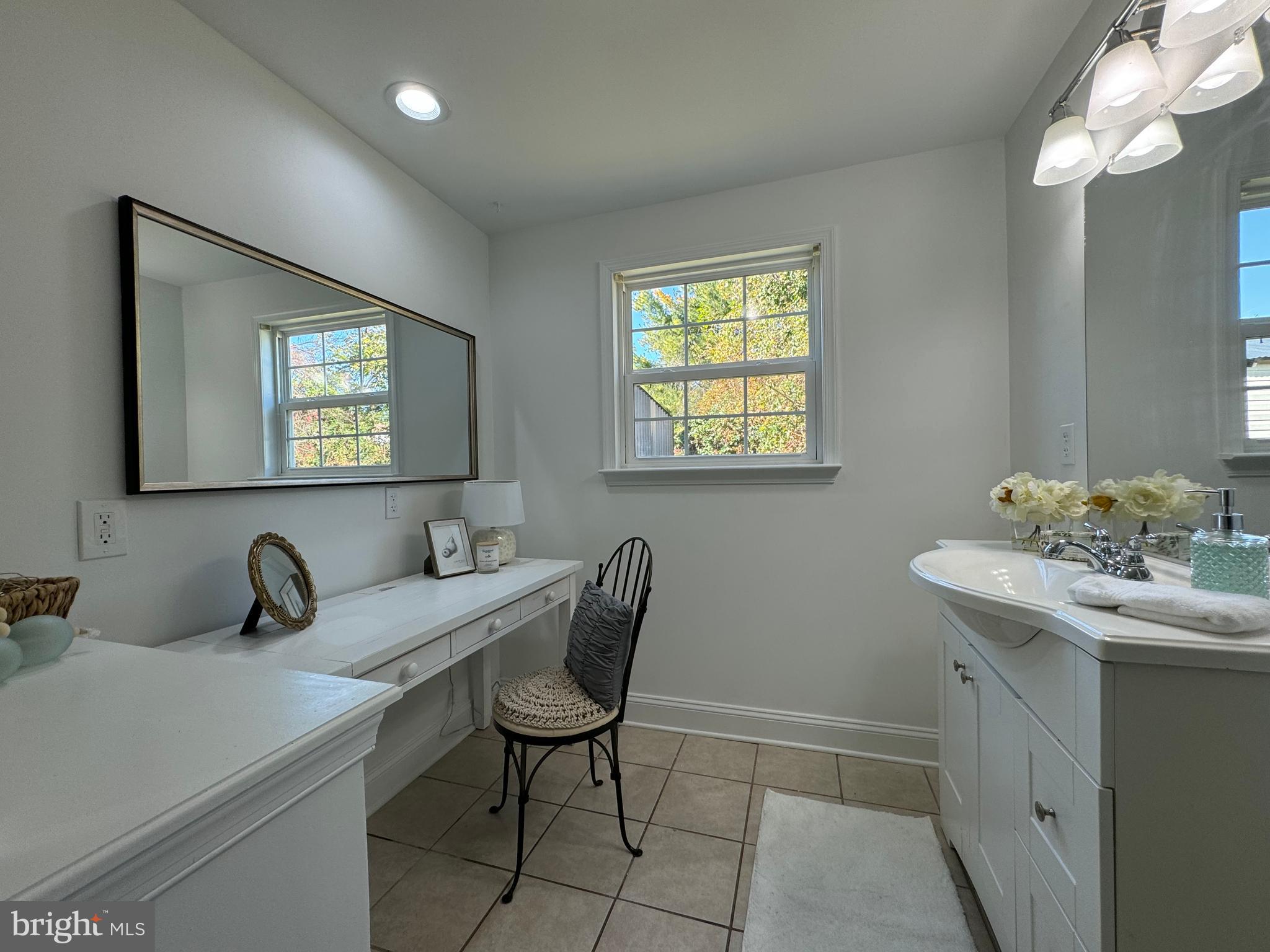 1581 Skinners Turn Road Owings, MD 20736 - Photo 32 of 37 a dining room with table chairs and window