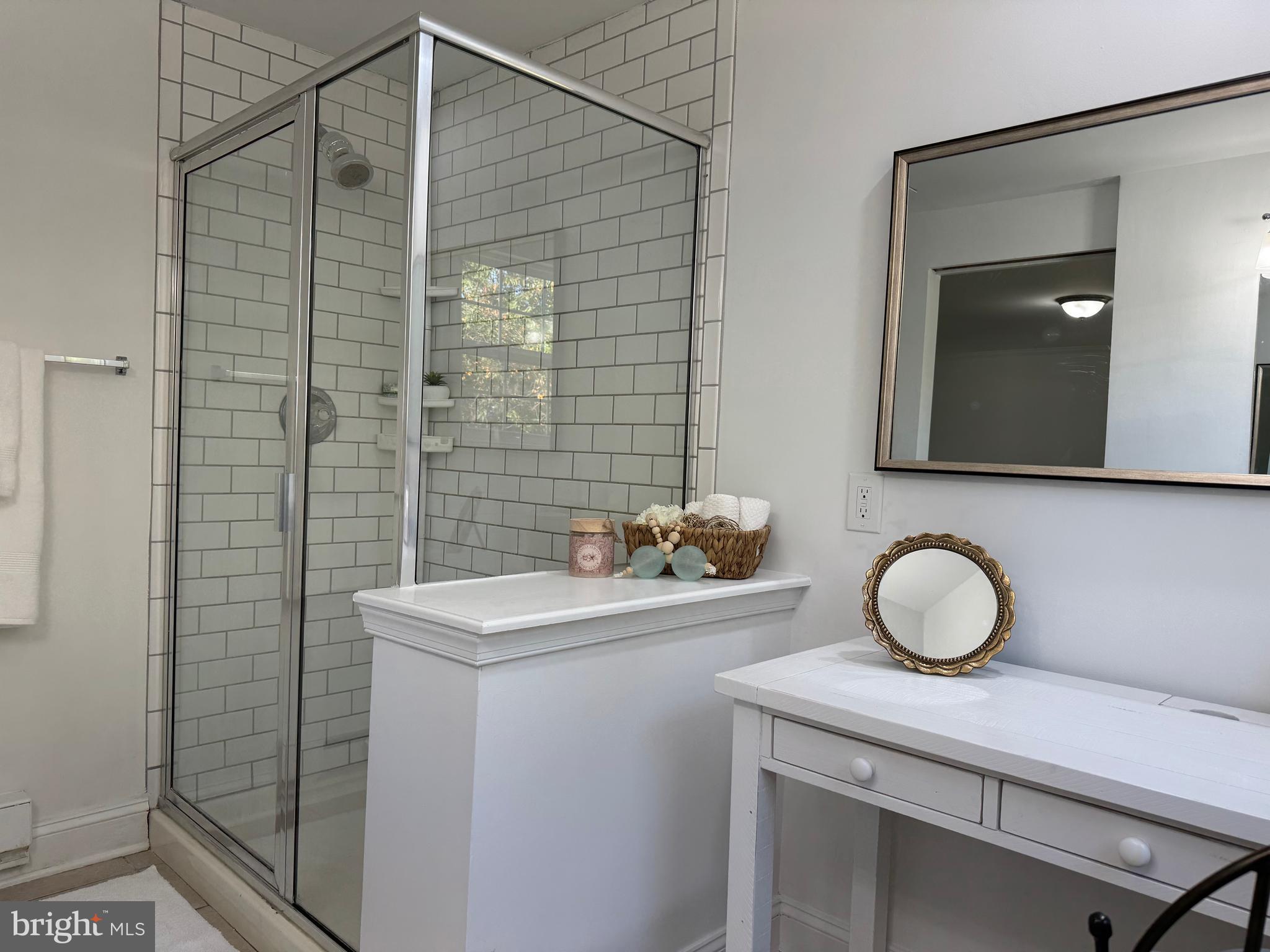 1581 Skinners Turn Road Owings, MD 20736 - Photo 34 of 37 a bathroom with a sink and a mirror