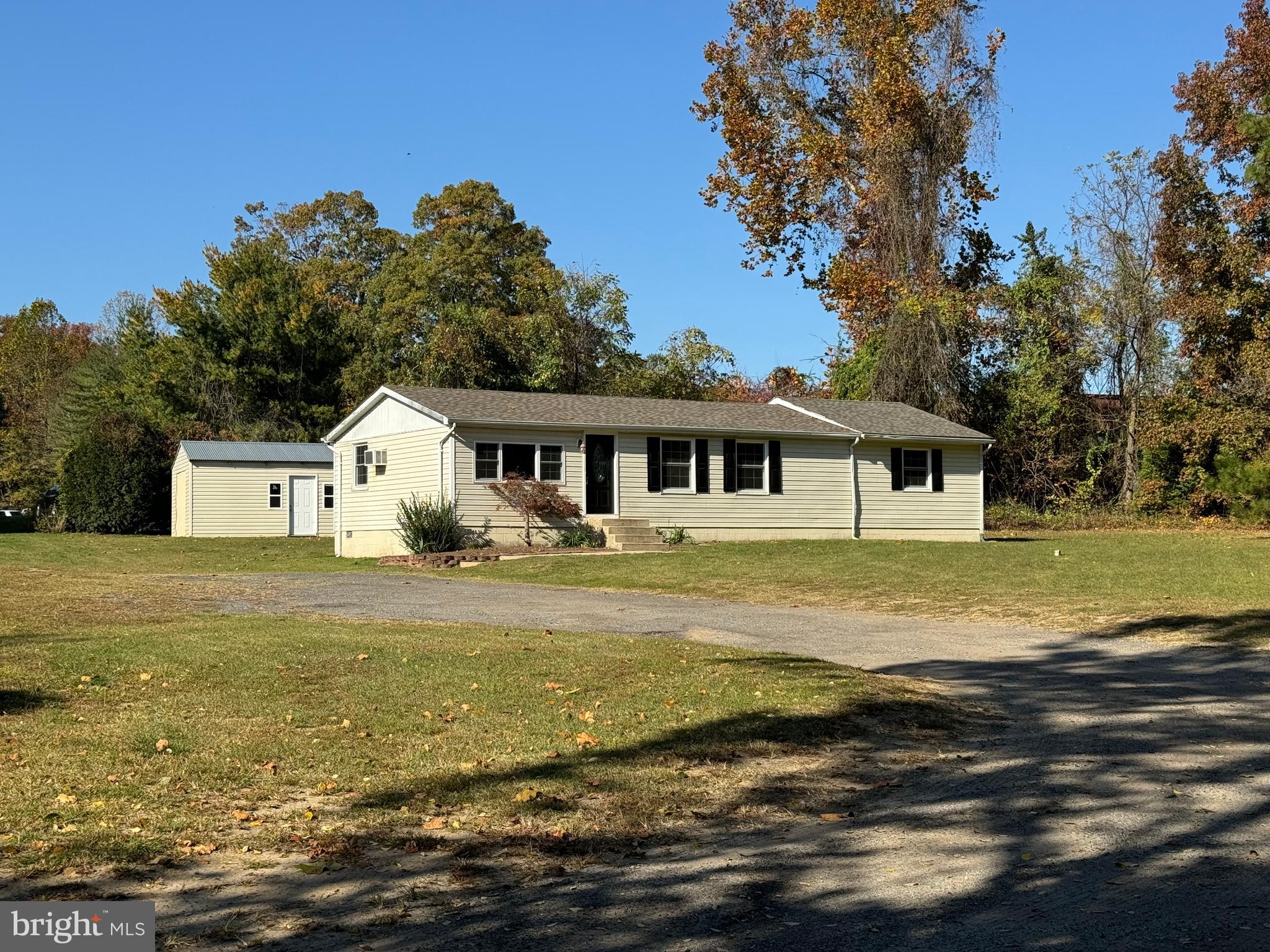 1581 Skinners Turn Road Owings, MD 20736 - Photo 37 of 37 a front view of a house with a yard