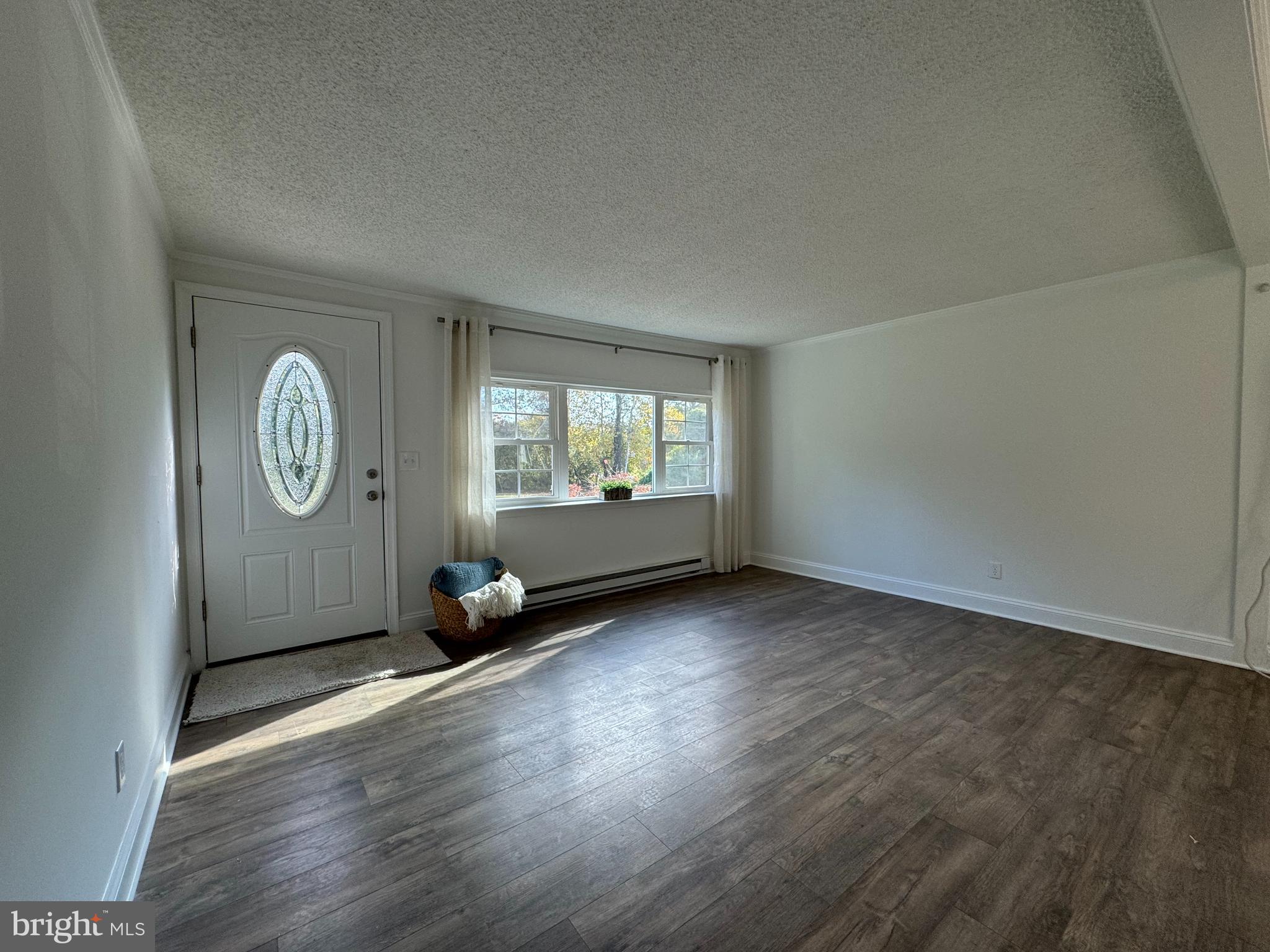 1581 Skinners Turn Road Owings, MD 20736 - Photo 9 of 37 an empty room with windows