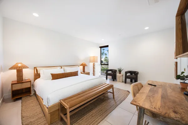 a bathroom with a sink vanity and a mirror