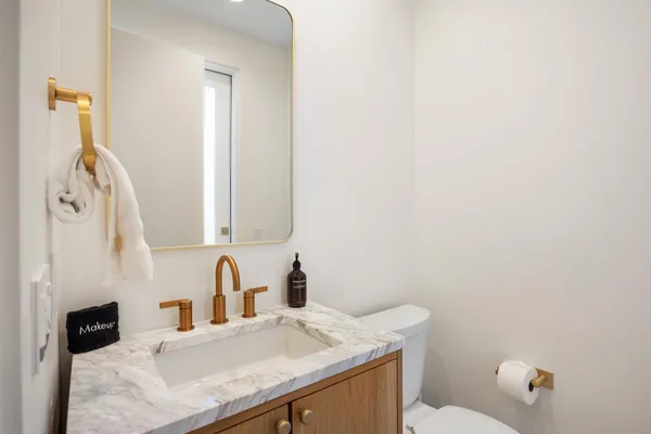 a view of a patio with swimming pool table and chairs