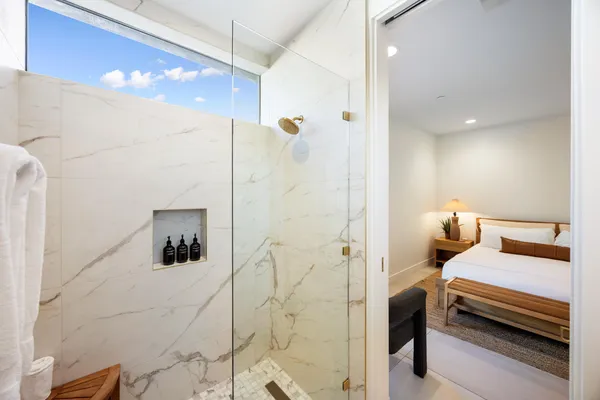 a view of a big yard with palm trees