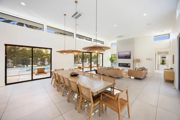 a bedroom with a bed and a night stand