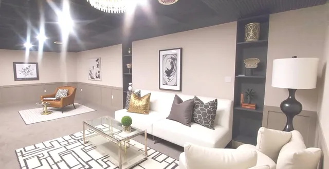 a bathroom with a granite countertop sink and mirror