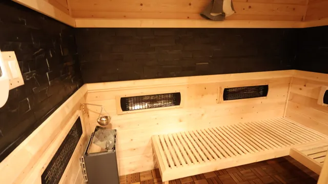 a bed room with bed and window