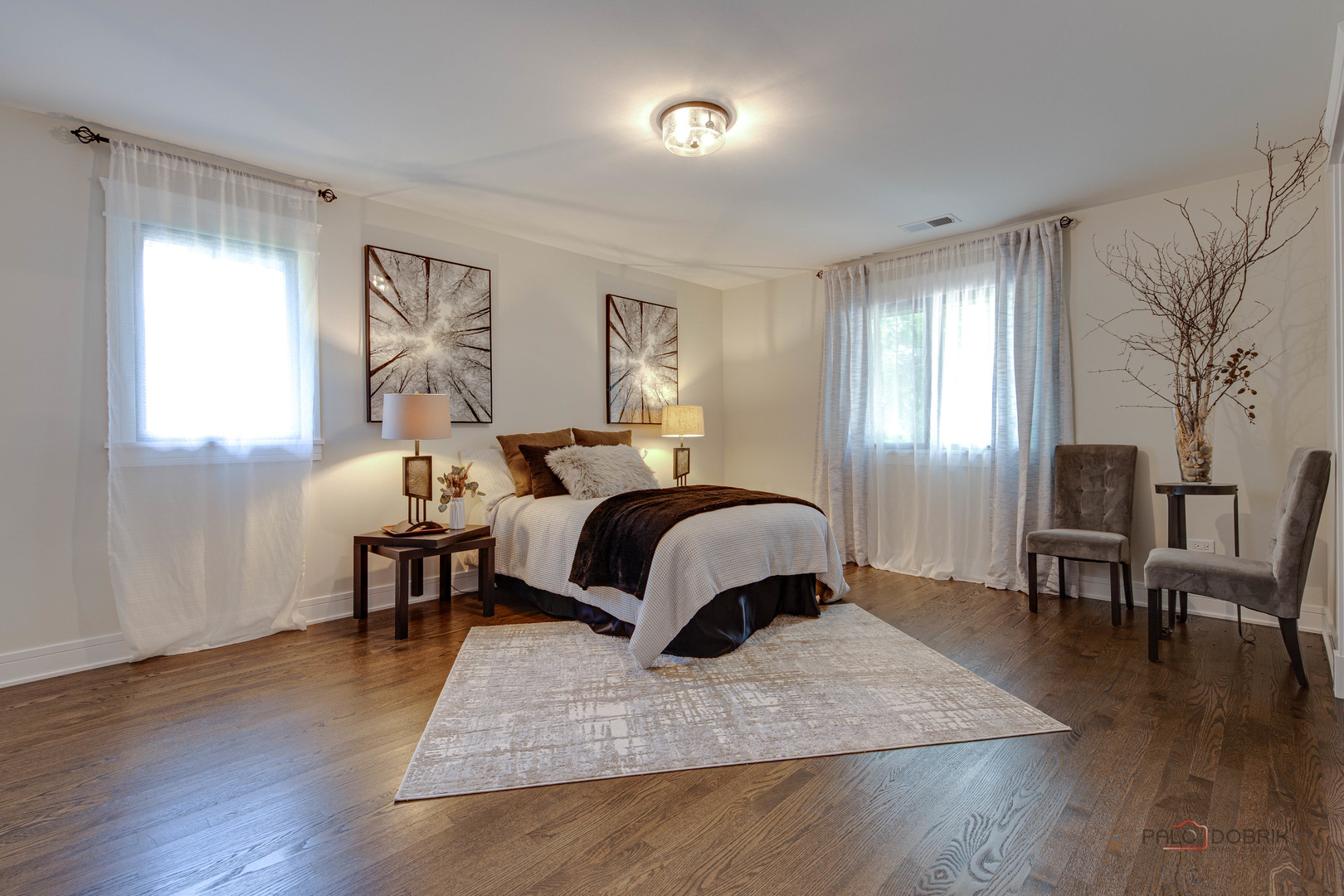 2221 Donegal Drive Darien, IL 60561 - Photo 45 of 62 a bedroom with a bed lamps and wooden floor