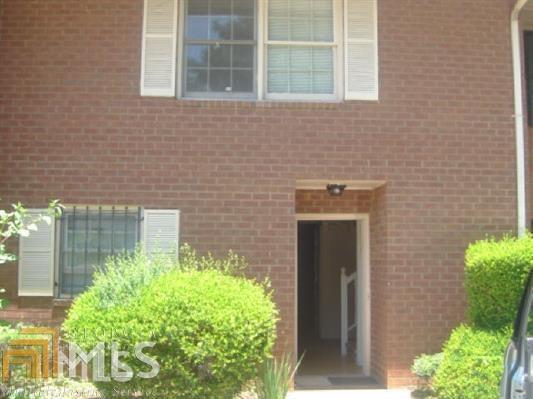 4534 Golf Vista Circle Decatur, GA 30035 - Photo 1 of 1 a front view of a house with a yard