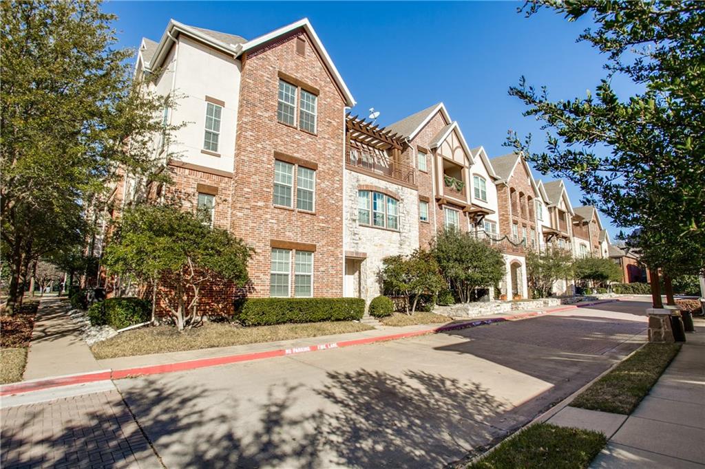 a view of a building with a street
