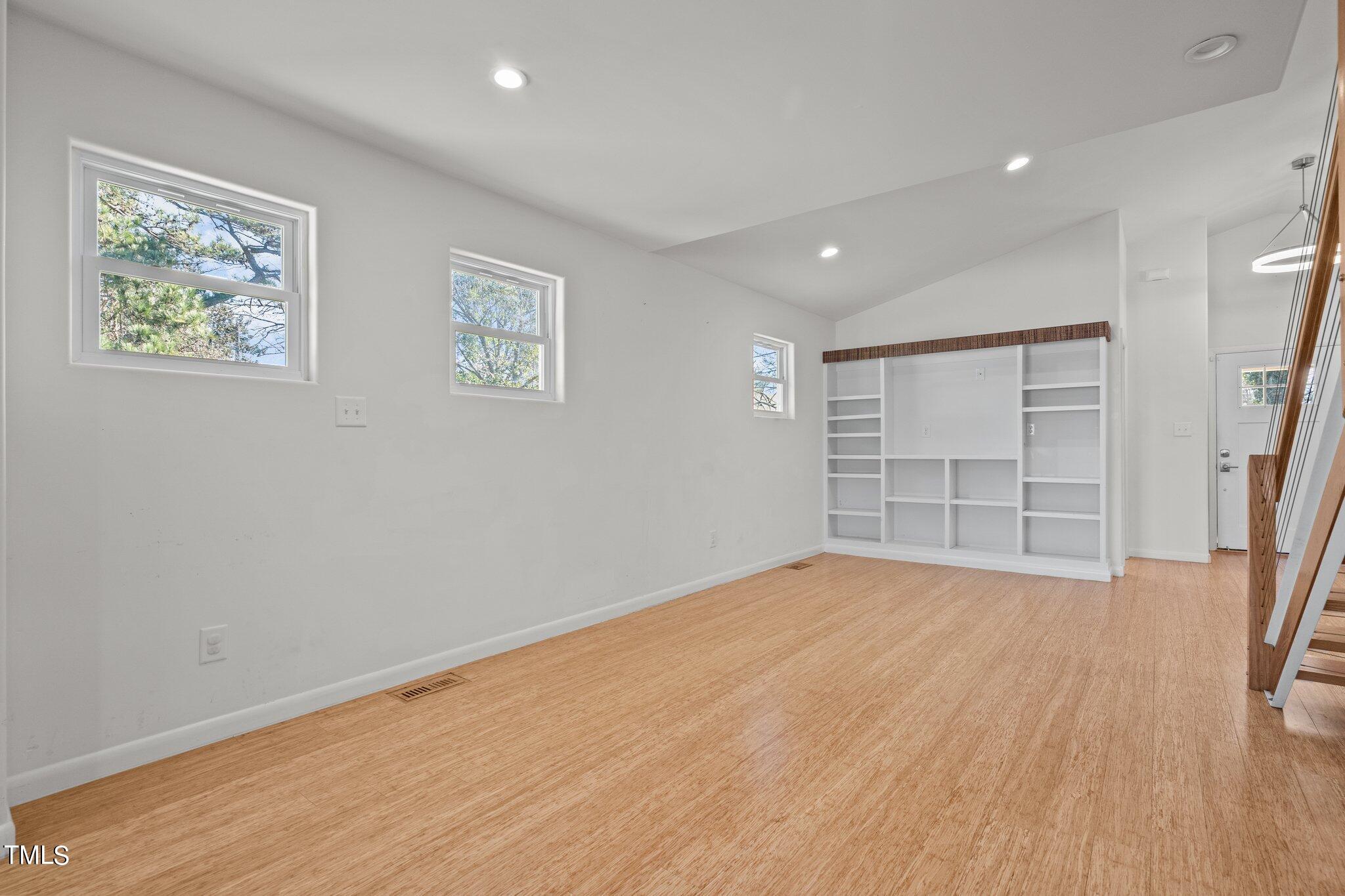 1427 East Lane Street Raleigh, NC 27610 - Photo 6 of 53 Living room towards entrance