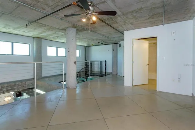 a view of a hallway with seating area