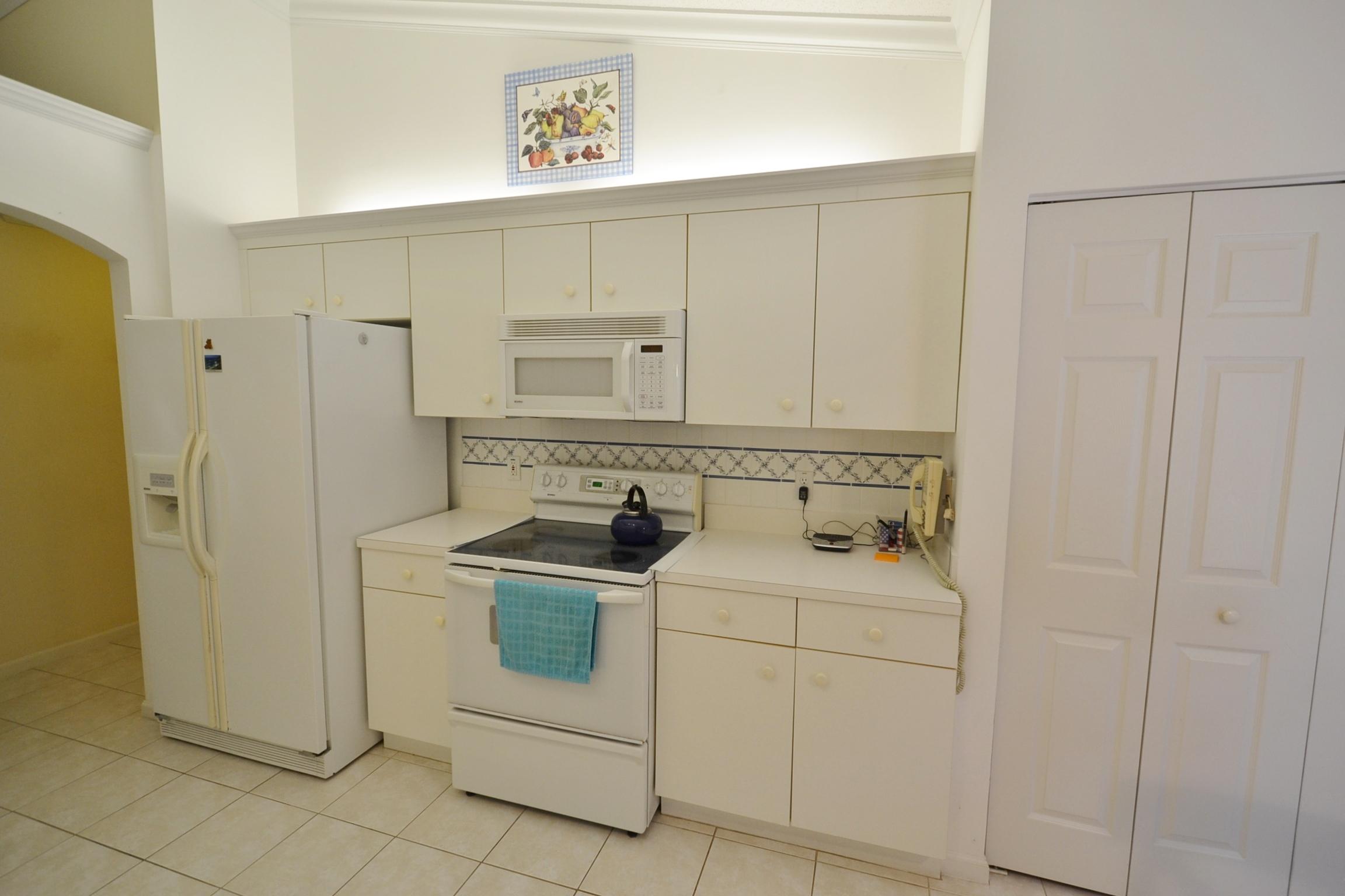 112 West Lee Road Delray Beach, FL 33445 - Photo 17 of 30 a utility room with dryer and washer