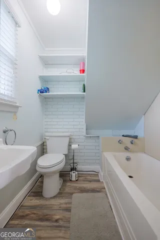 a bathroom with a sink and a bathtub