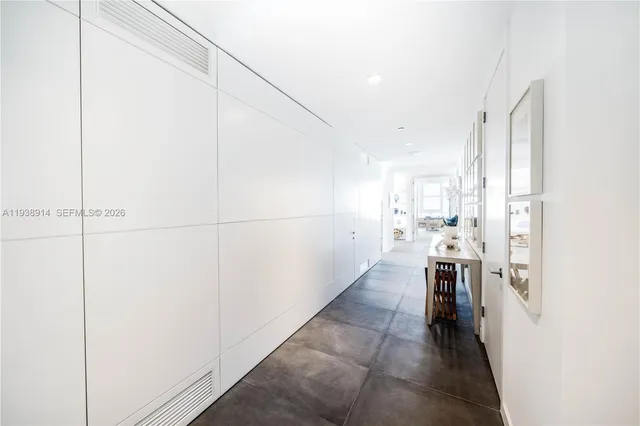a view of a kitchen with a sink