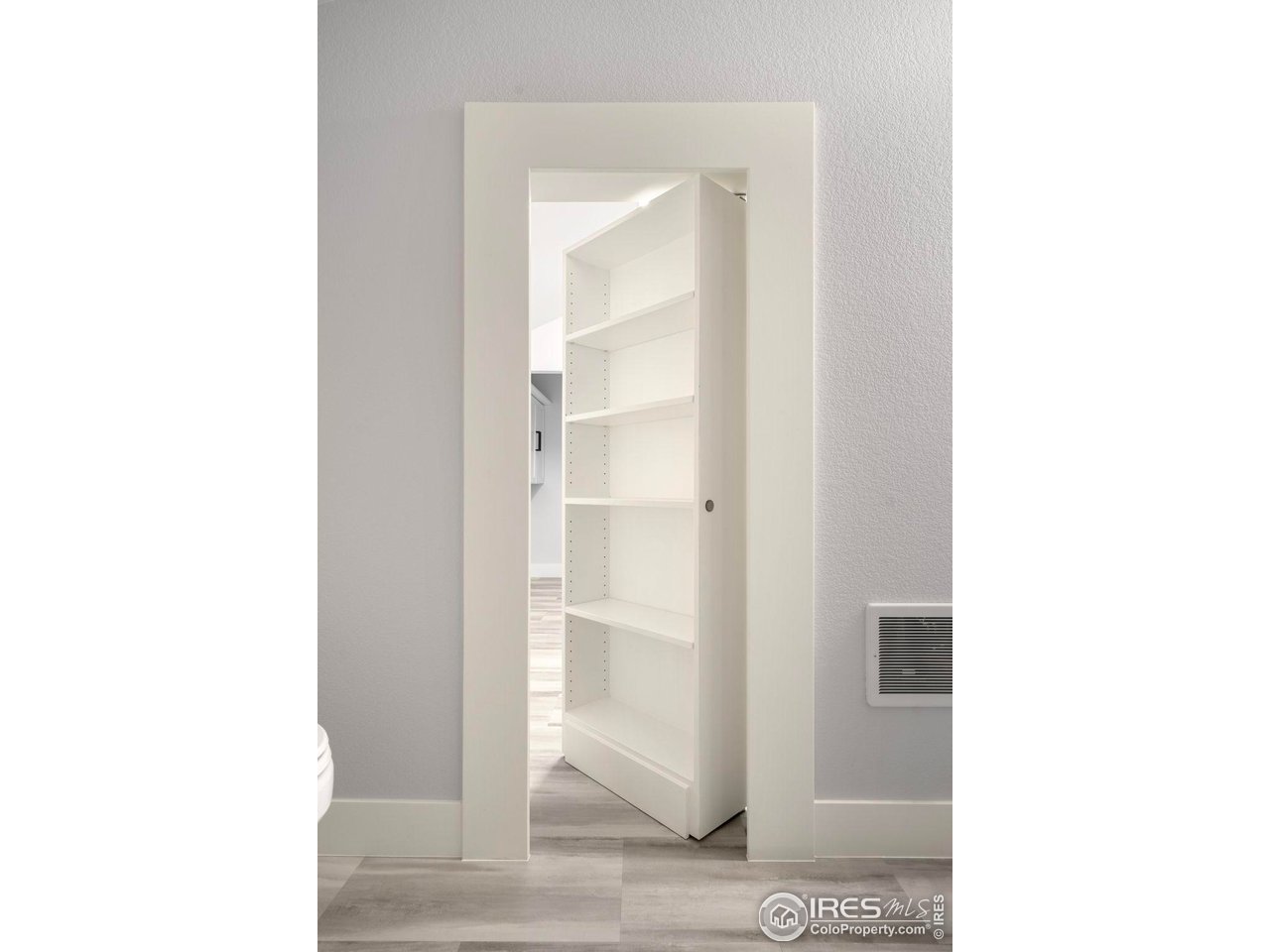 3482 Southeast Frontage Road Fort Collins, CO 80525 - Photo 19 of 47 a picture of a room with a door