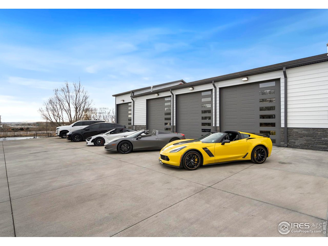 3482 Southeast Frontage Road Fort Collins, CO 80525 - Photo 28 of 47 a view of yard with car parked
