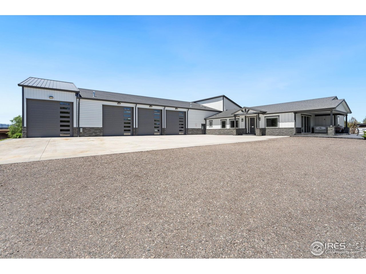 3482 Southeast Frontage Road Fort Collins, CO 80525 - Photo 5 of 47 a view of a house with a yard
