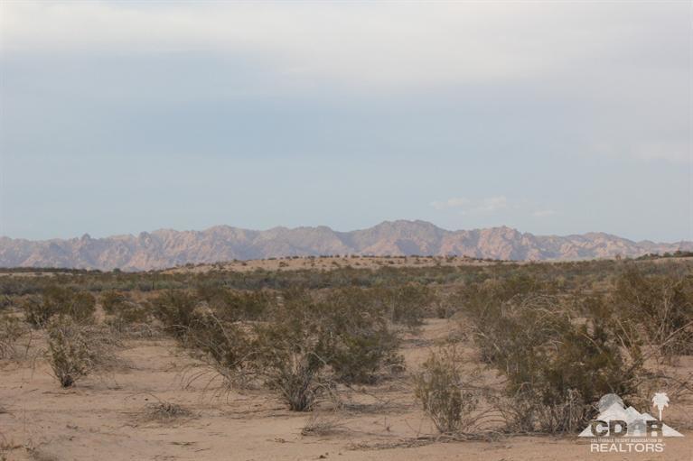 a view of lake with mountain