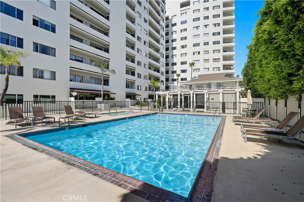7250 Franklin Avenue, Unit 1203 Los Angeles, CA 90046 - Photo 32 of 37 a view of building with swimming pool and sitting area