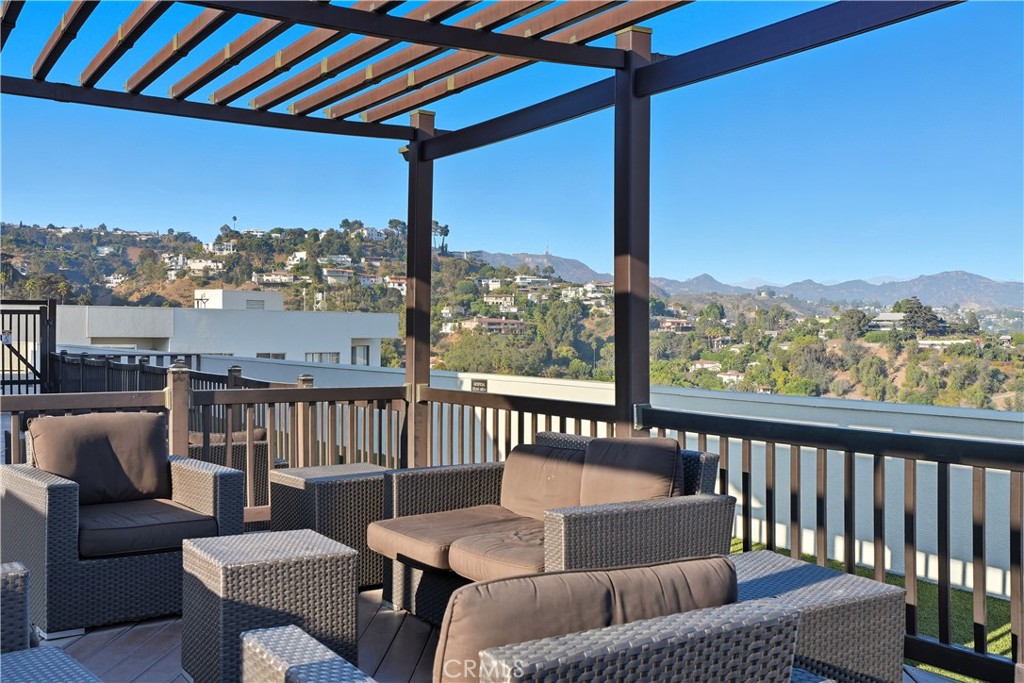 7250 Franklin Avenue, Unit 1203 Los Angeles, CA 90046 - Photo 34 of 37 a balcony with furniture