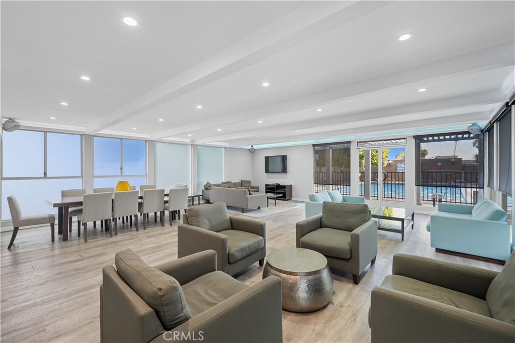 7250 Franklin Avenue, Unit 1203 Los Angeles, CA 90046 - Photo 37 of 37 a living room with furniture and a large window