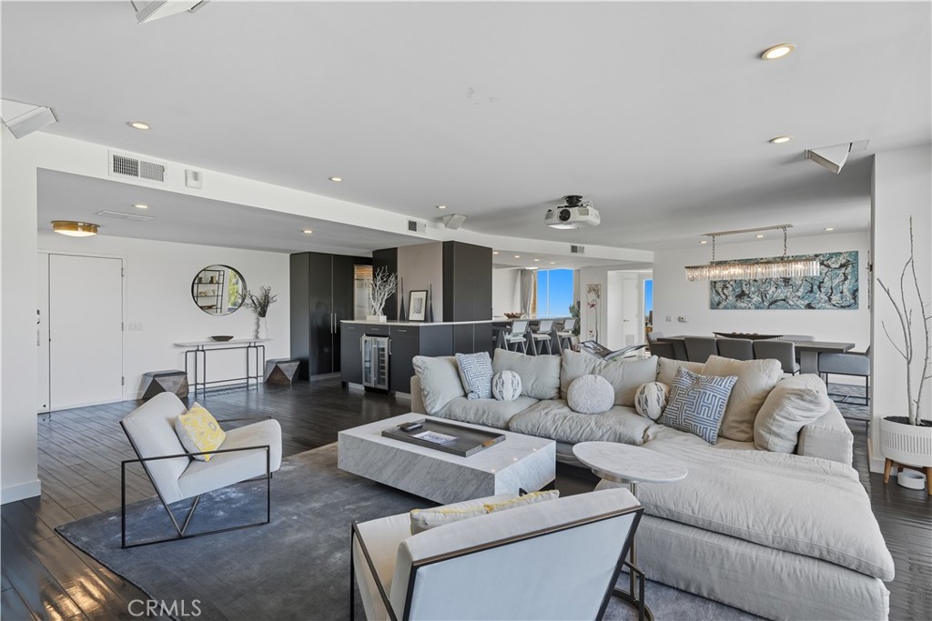 7250 Franklin Avenue, Unit 1203 Los Angeles, CA 90046 - Photo 6 of 37 a living room with furniture and wooden floor