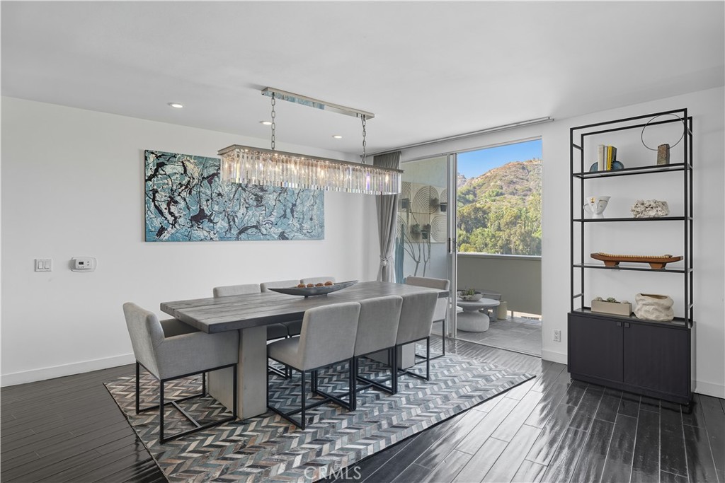 7250 Franklin Avenue, Unit 1203 Los Angeles, CA 90046 - Photo 7 of 37 a view of a dining room with furniture window and wooden floor