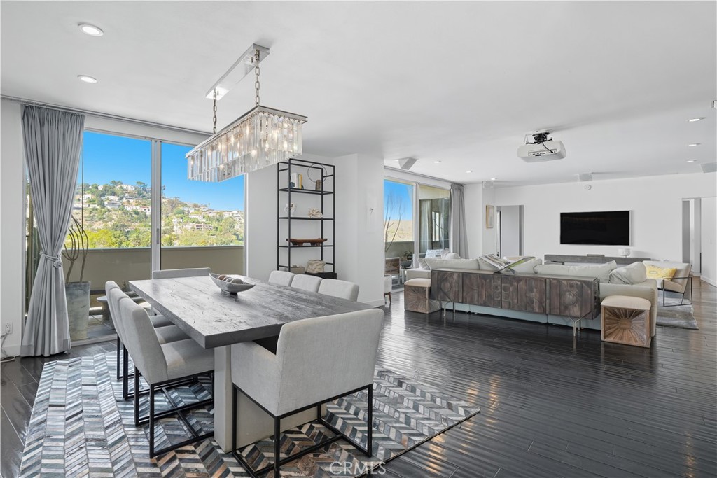 7250 Franklin Avenue, Unit 1203 Los Angeles, CA 90046 - Photo 8 of 37 a view of a dining room with furniture window and wooden floor
