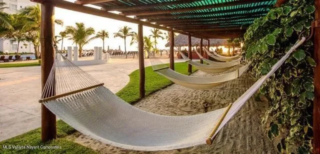 a view of swimming pool from a balcony