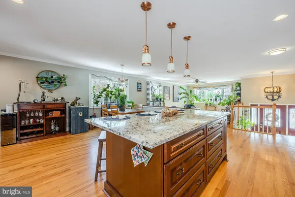 a view of a kitchen and dining room