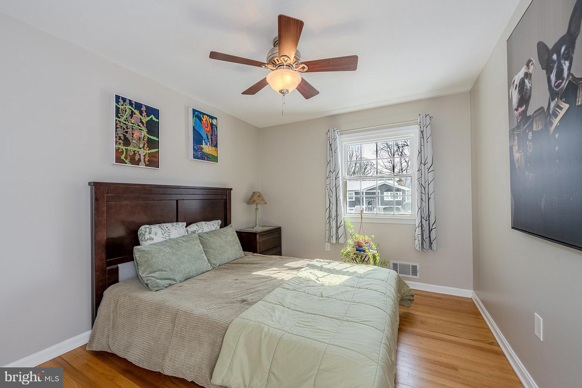 6112 Harmon Place Springfield, VA 22152 - Photo 20 of 33 a bedroom with a bed and a window