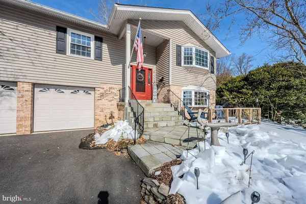 a backyard of a house with seating space
