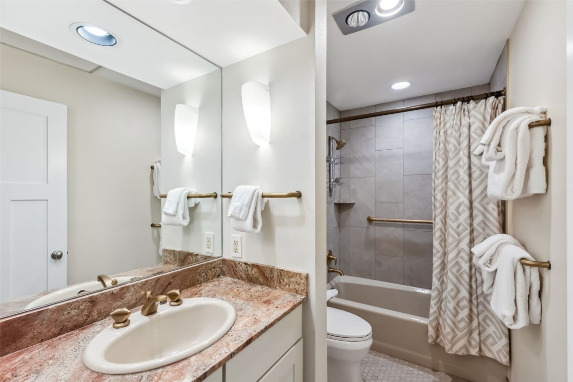 1207 West Keystone Road, Unit 2701 Keystone, CO 80435 - Photo 22 of 41 Full bathroom with vanity, shower / bath combination with curtain, tile patterned floors, and recessed lighting