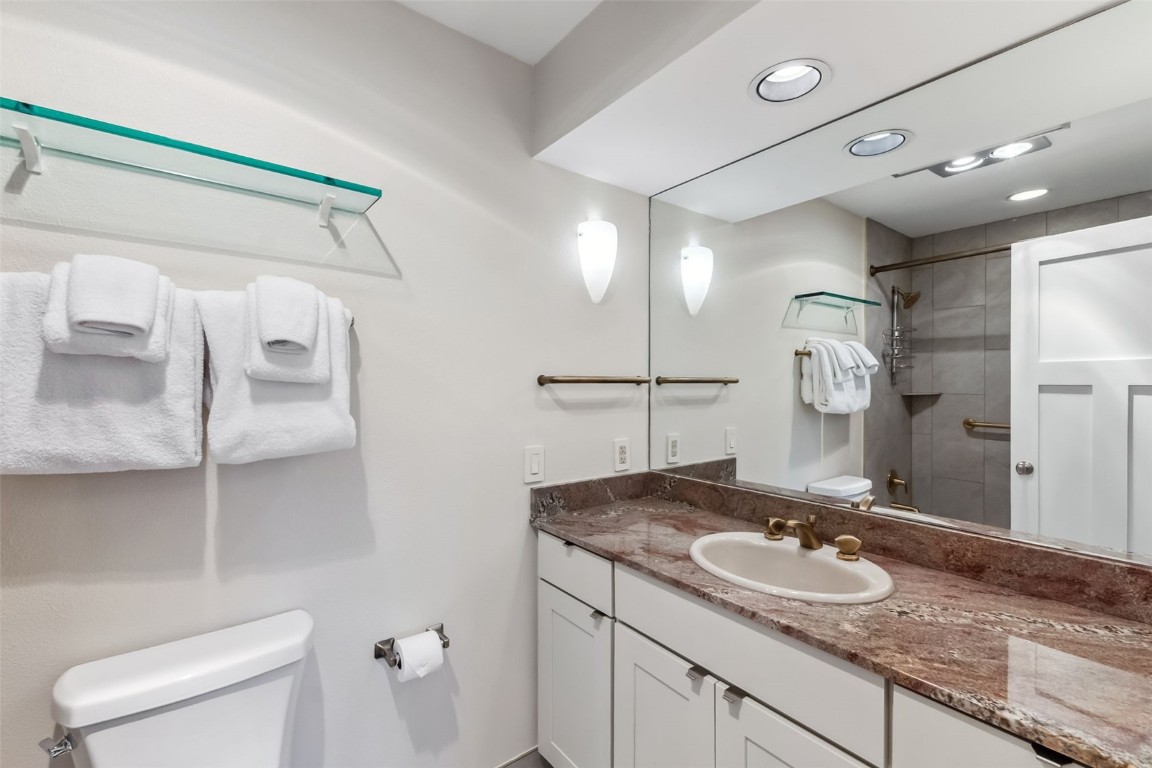 1207 West Keystone Road, Unit 2701 Keystone, CO 80435 - Photo 23 of 41 Bathroom featuring a tile shower, vanity, and recessed lighting