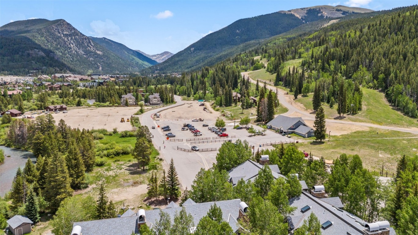 1207 West Keystone Road, Unit 2701 Keystone, CO 80435 - Photo 40 of 41 Aerial perspective of suburban area with a mountainous background