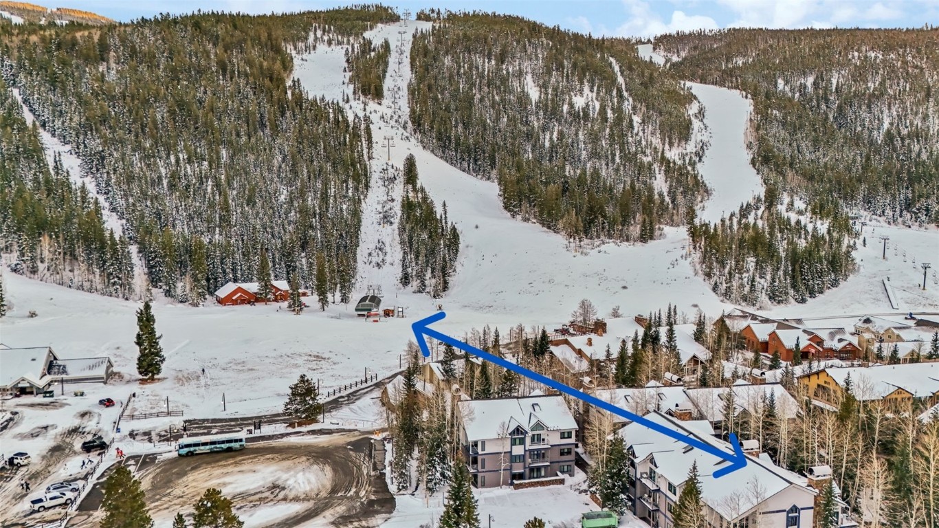 1207 West Keystone Road, Unit 2701 Keystone, CO 80435 - Photo 41 of 41 Snowy aerial view with a mountain view