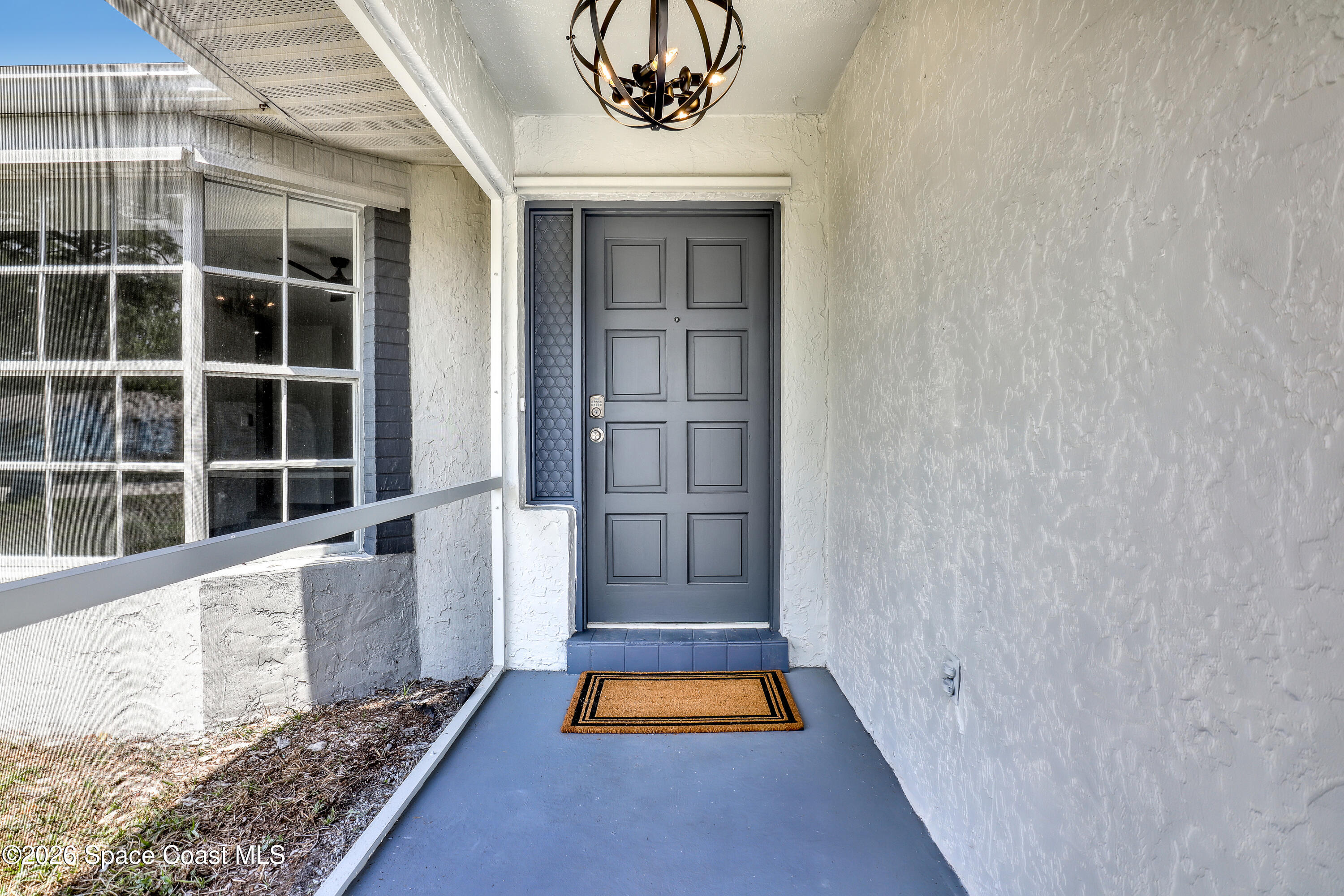 999 Castile Road Southeast Palm Bay, FL 32909 - Photo 5 of 45 Front screened entrance