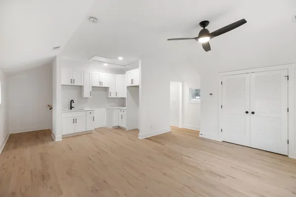 a view of a kitchen with electric appliances