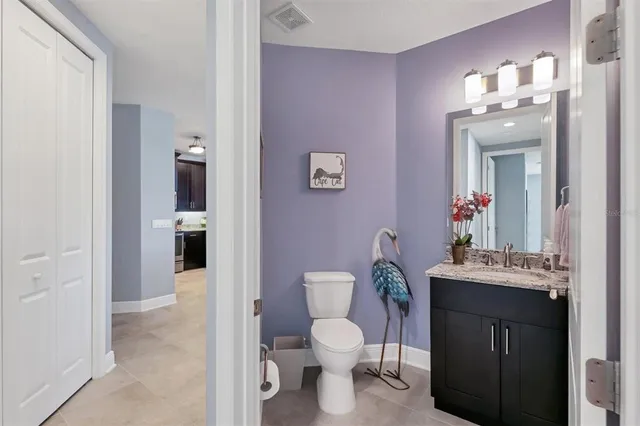 a bathroom with a sink and a washer