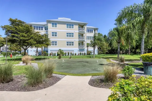 a view of a swimming pool with a garden