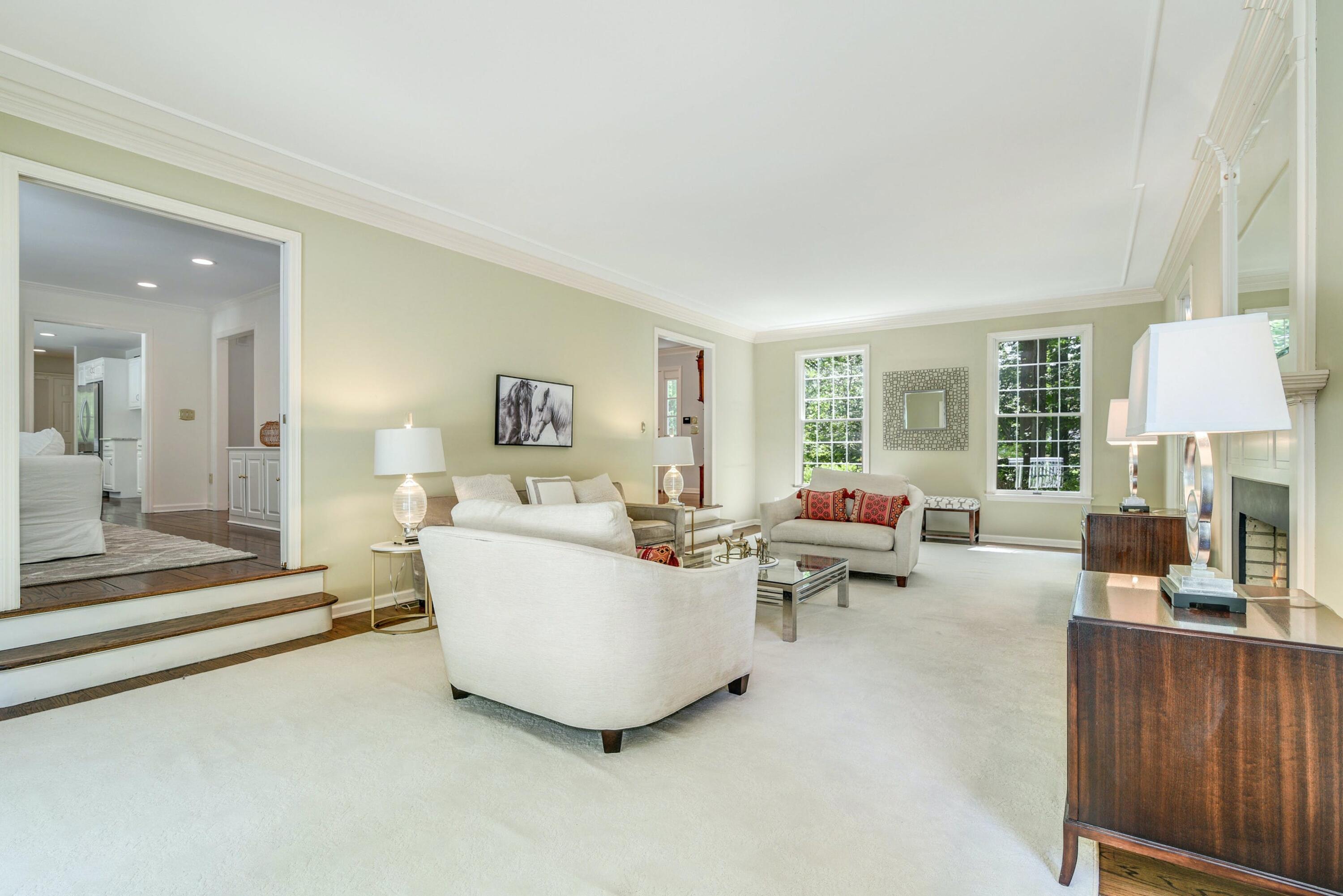 220 Old Norwalk Road New Canaan, CT 06840 - Photo 12 of 36 a living room with furniture and a large window