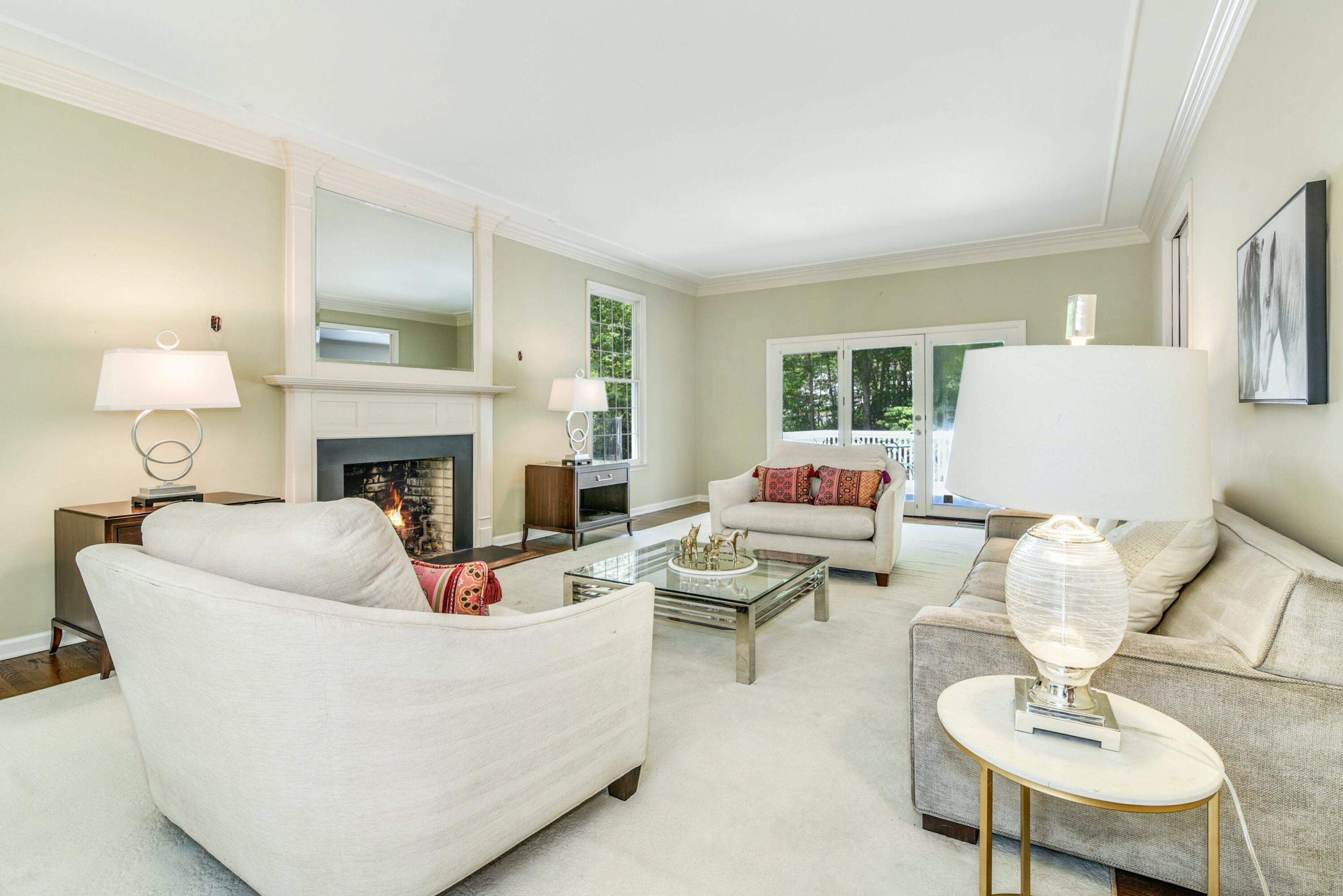 220 Old Norwalk Road New Canaan, CT 06840 - Photo 13 of 36 a living room with furniture and a fireplace