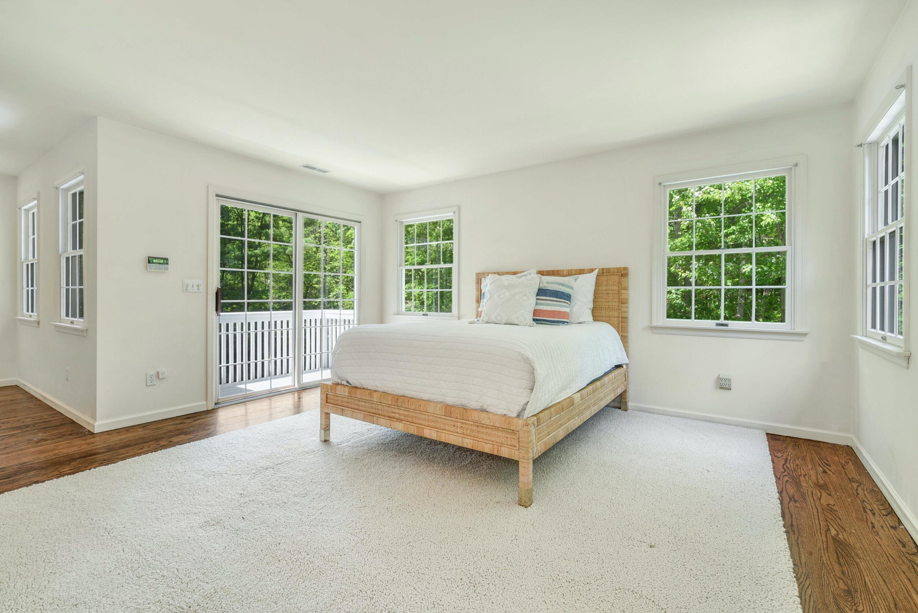 220 Old Norwalk Road New Canaan, CT 06840 - Photo 26 of 36 a bedroom with a bed and a window