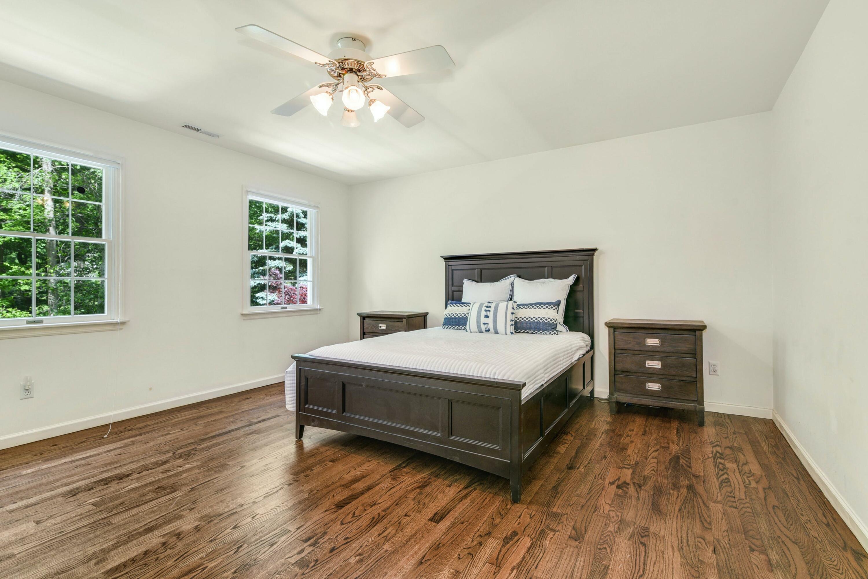 220 Old Norwalk Road New Canaan, CT 06840 - Photo 30 of 36 a bedroom with a bed and a window