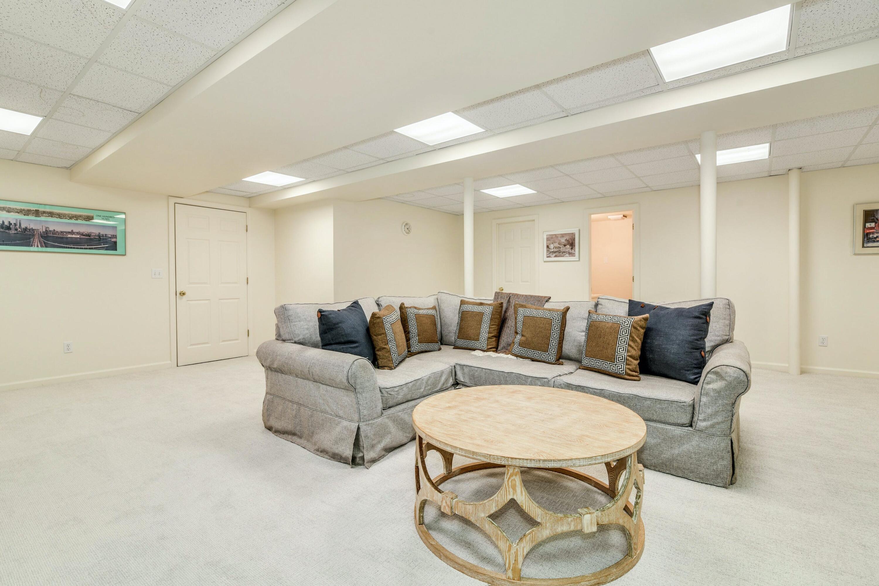 220 Old Norwalk Road New Canaan, CT 06840 - Photo 31 of 36 a living room with furniture and a wooden floor