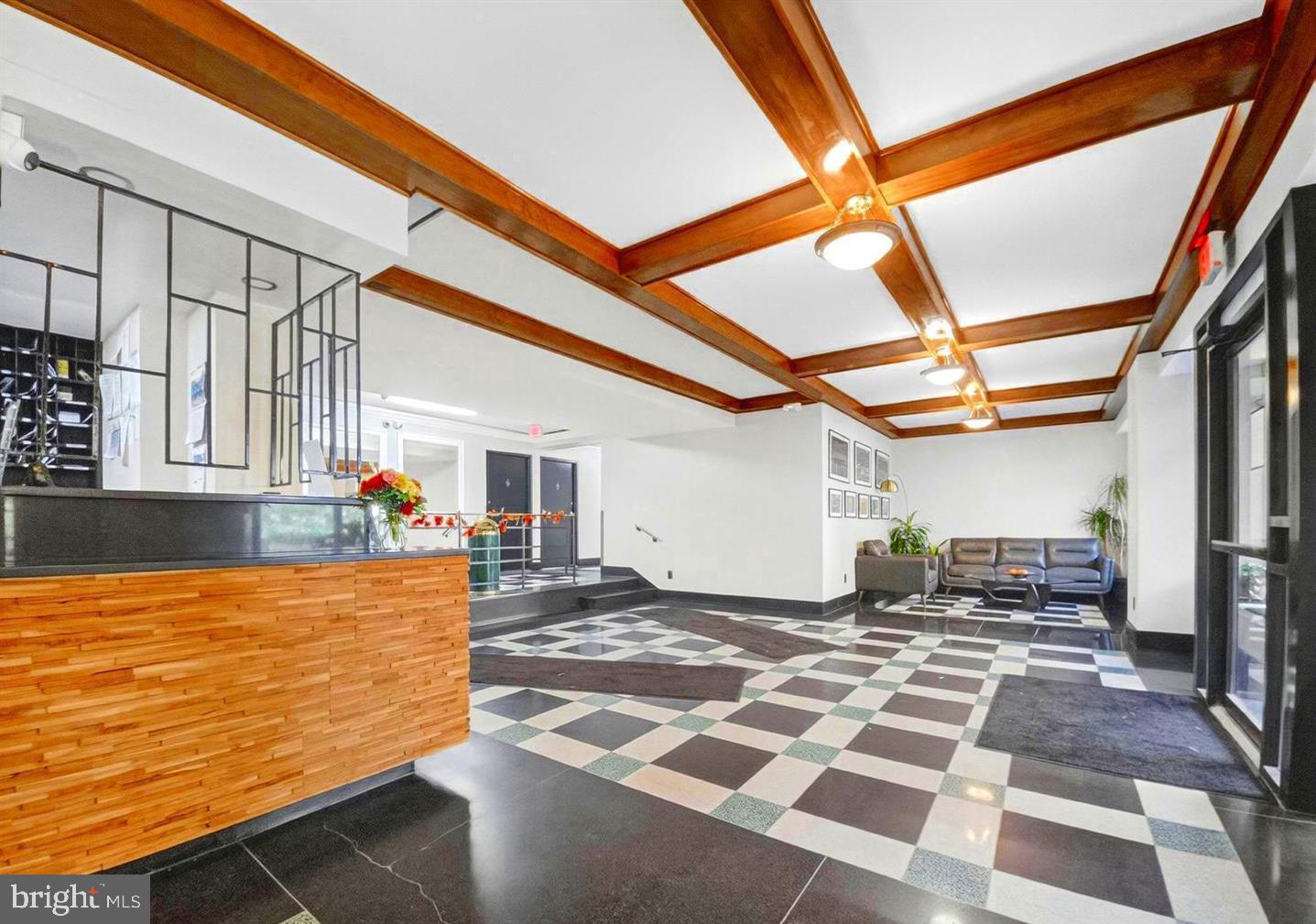 1801 Clydesdale Place Northwest, Unit 420 Washington, DC 20009 - Photo 28 of 33 a view of a porch with furniture and floor to ceiling window