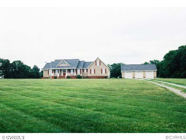16775 Hudgins Road Dewitt, VA 23840 - Photo 1 of 11 a view of a house with a big yard