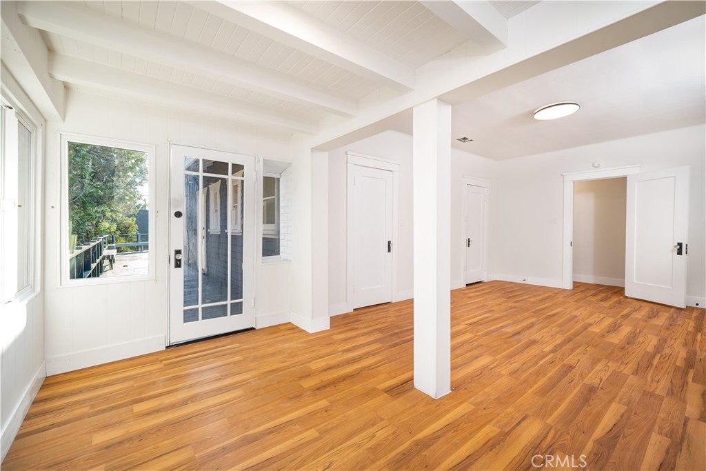 843 Cedar Avenue Long Beach, CA 90813 - Photo 17 of 42 a view of empty room with wooden floor and fan